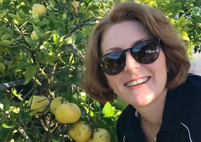 Veronica Hayes with a citrus plant